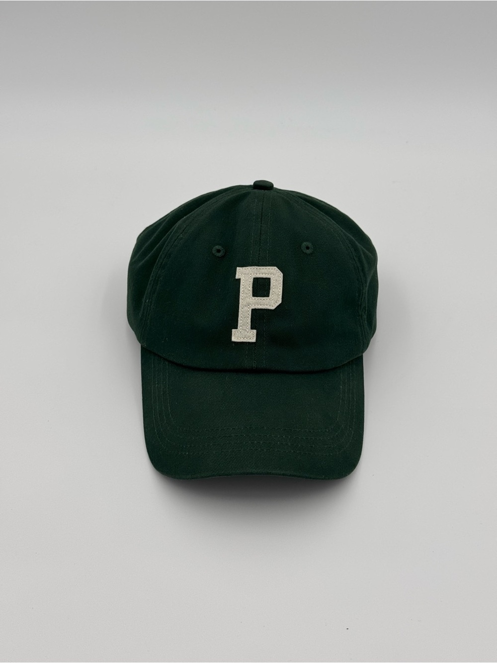 Dark Green Baseball Cap with Cream 'P' Patch